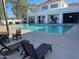 Inviting community pool with lounge chairs and shaded seating areas, perfect for relaxation at 20840 E Vía Del Palo --, Queen Creek, AZ 85142