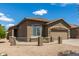 This single-story home features a well-maintained exterior and a two-car garage at 20840 E Vía Del Palo --, Queen Creek, AZ 85142