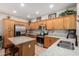 This kitchen features stainless steel appliances, granite countertops, and updated cabinets at 20840 E Vía Del Palo --, Queen Creek, AZ 85142