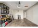 Organized garage with plenty of storage on shelving and a blank slate for future projects at 2301 E Alpine E Ave, Mesa, AZ 85204