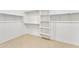 Walk-in closet with built-in shelving and ample storage space at 2458 E Lark St, Gilbert, AZ 85297