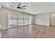 Spacious living room with sliding glass doors leading to an outdoor space at 2458 E Lark St, Gilbert, AZ 85297