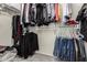 Organized walk-in closet featuring ample shelving and hanging space for clothes and accessories at 2478 W Allens Peak Dr, San Tan Valley, AZ 85144