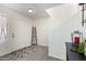 Bright entryway with neutral walls and a stylish gray rug and light colored floors at 2478 W Allens Peak Dr, San Tan Valley, AZ 85144