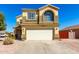 Charming two-story home with a two-car garage and low-maintenance desert landscaping at 2478 W Allens Peak Dr, San Tan Valley, AZ 85144