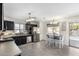 Bright and airy kitchen with stainless steel appliances and a cozy dining area at 2478 W Allens Peak Dr, San Tan Valley, AZ 85144