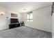 Spacious living room featuring natural lighting, and carpet at 2478 W Allens Peak Dr, San Tan Valley, AZ 85144