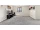 Well-lit living room featuring decor and carpeted floors at 2478 W Allens Peak Dr, San Tan Valley, AZ 85144