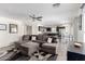 Open floor plan living room with modern finishes and seamless flow to the kitchen at 2478 W Allens Peak Dr, San Tan Valley, AZ 85144