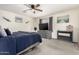 Cozy main bedroom featuring a fan and tv at 2478 W Allens Peak Dr, San Tan Valley, AZ 85144