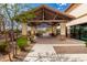 Covered outdoor patio area with ample seating, perfect for relaxing and socializing at 2478 W Allens Peak Dr, San Tan Valley, AZ 85144