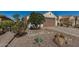 Single Gathering home with two car garage and desert landscaping at 27044 W Escuda Dr, Buckeye, AZ 85396