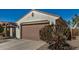 Single Gathering home with two car garage and desert landscaping at 27044 W Escuda Dr, Buckeye, AZ 85396