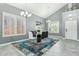 Dining room features modern chandelier, plantation shutters, and stylish decor at 2755 E Cowboy Cove Trl, San Tan Valley, AZ 85143