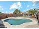 Backyard oasis with a private pool, patio area, and desert landscaping at 2755 E Cowboy Cove Trl, San Tan Valley, AZ 85143