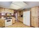 Cozy kitchen featuring lots of cabinet space, and laminate countertops at 2801 N Dakota St, Chandler, AZ 85225