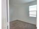 Bright bedroom with neutral carpet and window, creating a clean and inviting space at 2994 N 305Th Dr, Buckeye, AZ 85396