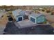 This single-story home features a gray exterior, two-car garage, and a circular tower entry at 3002 W Josiah Trl, Queen Creek, AZ 85144