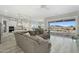 Open-concept living room with great views and a large sectional sofa at 3002 W Josiah Trl, Queen Creek, AZ 85144