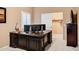 Spacious office featuring an executive desk and a double-monitor setup at 3017 S Mesita --, Mesa, AZ 85212