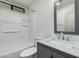 Contemporary bathroom with white fixtures, a vanity with a marble countertop, and a shower at 3104 E Broadway Rd # 276, Mesa, AZ 85204