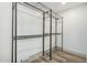 Spacious walk-in closet with black metal shelving to maximize storage and organization at 3104 E Broadway Rd # 276, Mesa, AZ 85204