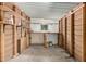 Unfinished garage interior with built-in shelves and workbench at 3104 E Broadway Rd # 276, Mesa, AZ 85204