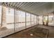 Relaxing enclosed sunroom with screened walls and a view of lush greenery at 3104 E Broadway Rd # 276, Mesa, AZ 85204