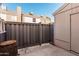 Fenced in patio with privacy fence, pavers, and exterior storage unit at 3334 W Morrow Dr # 3, Phoenix, AZ 85027