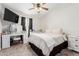 Spacious bedroom with a large bed, vanity, and ample natural light at 3334 W Morrow Dr # 3, Phoenix, AZ 85027