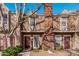 Inviting townhouse exterior with a red brick chimney and neat landscaping at 3334 W Morrow Dr # 3, Phoenix, AZ 85027