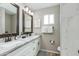 Elegant bathroom with double sinks, marble countertops, and modern fixtures at 4381 N 86Th St, Scottsdale, AZ 85251