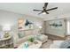 Bright living room with neutral tones, stylish decor, and wood-look floors at 4381 N 86Th St, Scottsdale, AZ 85251