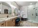 Modern bathroom with double sinks, a standalone tub, and a glass-enclosed shower at 4411 E Spur Dr, Cave Creek, AZ 85331