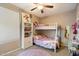 Charming bedroom with playful decor and a bunk bed at 4411 E Spur Dr, Cave Creek, AZ 85331