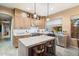 Bright kitchen featuring a large island, modern appliances, and elegant countertops at 4411 E Spur Dr, Cave Creek, AZ 85331