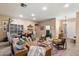 Bright and airy living room featuring stylish furniture and an adjacent dining area at 4411 E Spur Dr, Cave Creek, AZ 85331