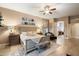 Tranquil main bedroom with decorative accents, a ceiling fan, and access to a bathroom at 4411 E Spur Dr, Cave Creek, AZ 85331