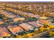 Scenic aerial view of the residential neighborhood with well-maintained homes and streets at 4462 S Frequency Dr, Mesa, AZ 85212