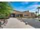 Modern community center with inviting entrance, desert landscaping, and architectural design, welcoming residents at 4462 S Frequency Dr, Mesa, AZ 85212