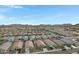 Aerial view of a residential community nestled among scenic mountains at 4595 W Stonecrop Dr, San Tan Valley, AZ 85144