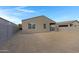 Expansive backyard featuring block fencing and potential for landscaping at 4595 W Stonecrop Dr, San Tan Valley, AZ 85144