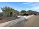 Charming single-story home with desert landscaping and a two-car garage at 4595 W Stonecrop Dr, San Tan Valley, AZ 85144