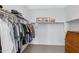 Organized walk-in closet with ample storage and built-in shelving for clothes and accessories at 4595 W Stonecrop Dr, San Tan Valley, AZ 85144