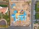 Aerial view of a large custom home under construction, featuring a birds eye view of the roof being installed at 6001 N 37Th Pl, Paradise Valley, AZ 85253