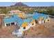 Aerial view of the custom home under construction, featuring the roof being installed in a desirable neighborhood at 6001 N 37Th Pl, Paradise Valley, AZ 85253