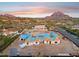 Aerial view of the custom home under construction, featuring the roof being installed in a desirable neighborhood at 6001 N 37Th Pl, Paradise Valley, AZ 85253