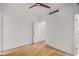 An empty bedroom with hardwood floors with attached ensuite at 7047 E Earll Dr # 1002, Scottsdale, AZ 85251