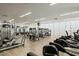 Well-equipped gym features modern weight-lifting equipment, and several stationary bikes, with abundant natural light at 7121 E Rancho Vista Dr # 2002, Scottsdale, AZ 85251