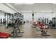 Modern gym featuring weight-lifting equipment, and multiple work-out stations, with abundant natural light at 7121 E Rancho Vista Dr # 2002, Scottsdale, AZ 85251